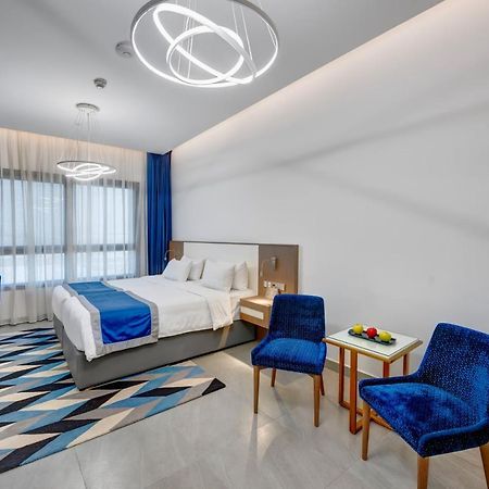 Abar Hotel Apartments Dip-1 Дубай Екстер'єр фото