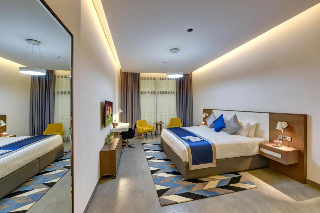 Abar Hotel Apartments Dip-1 Дубай Екстер'єр фото