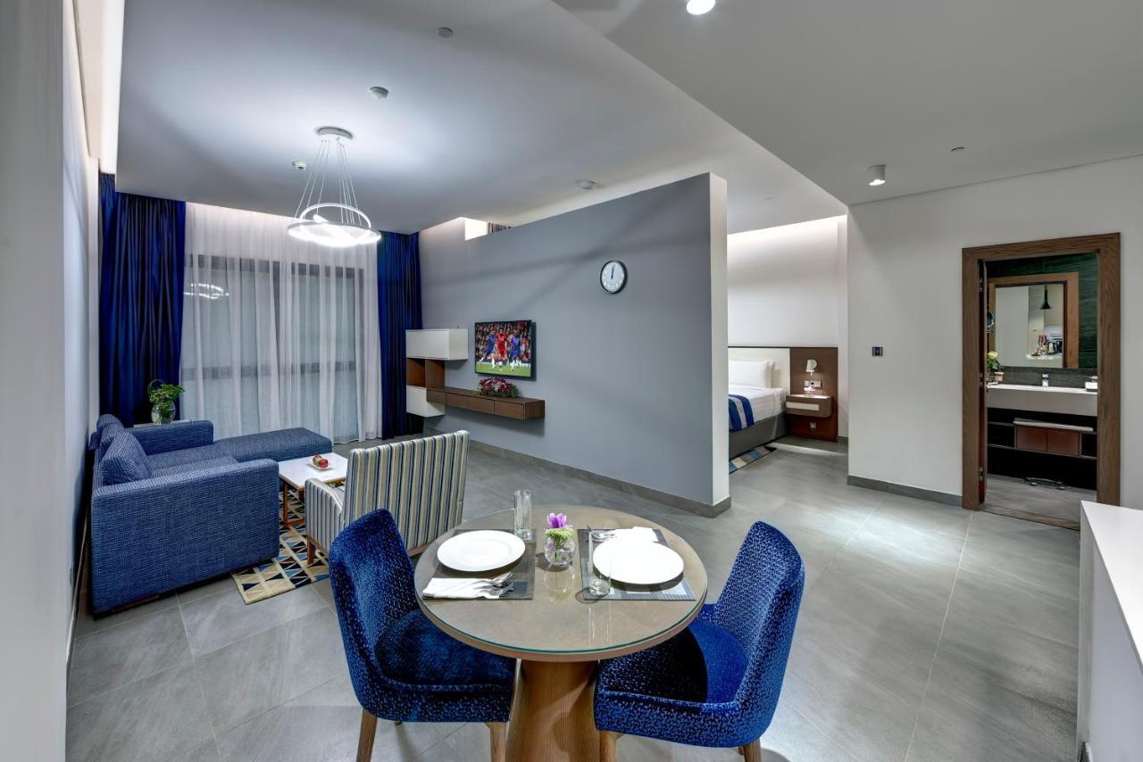 Abar Hotel Apartments Dip-1 Дубай Екстер'єр фото
