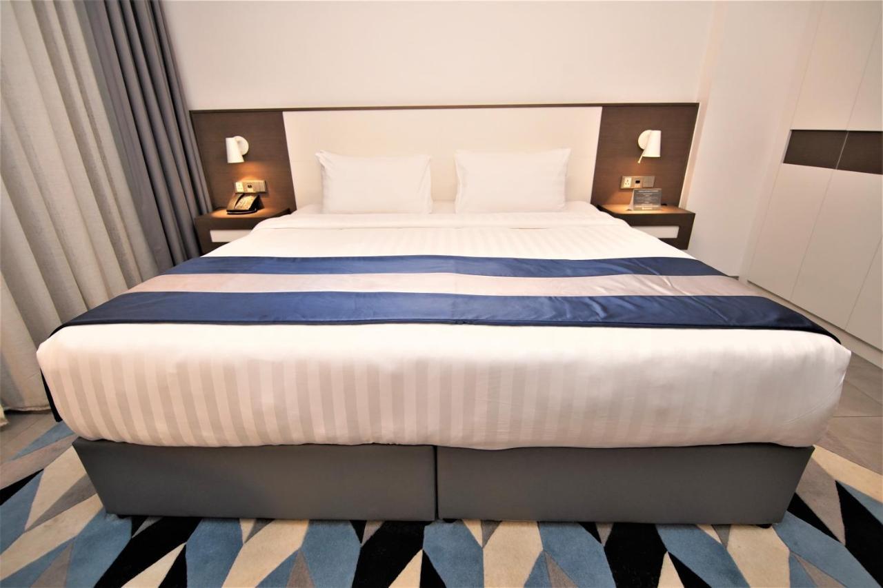 Abar Hotel Apartments Dip-1 Дубай Екстер'єр фото