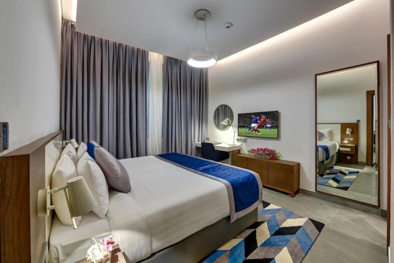 Abar Hotel Apartments Dip-1 Дубай Екстер'єр фото
