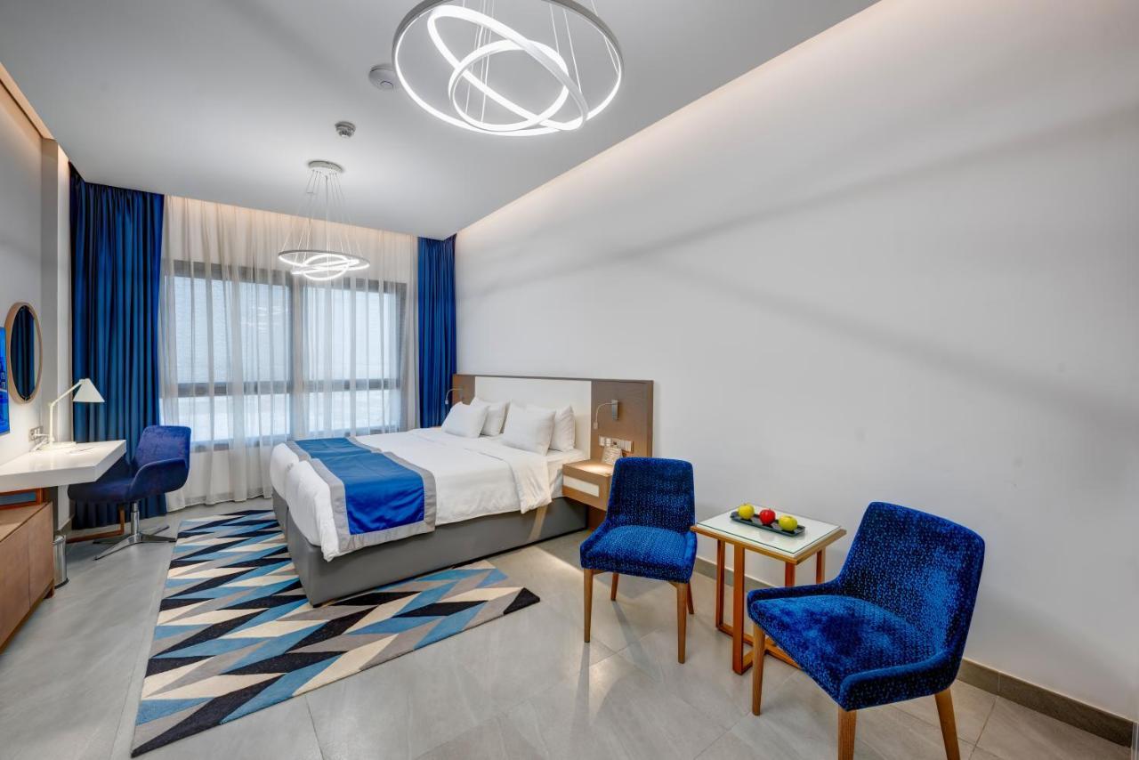 Abar Hotel Apartments Dip-1 Дубай Екстер'єр фото