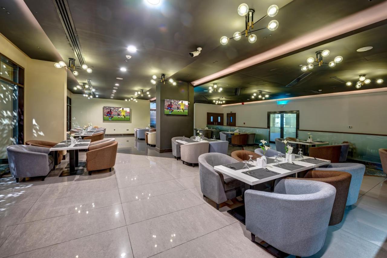Abar Hotel Apartments Dip-1 Дубай Екстер'єр фото